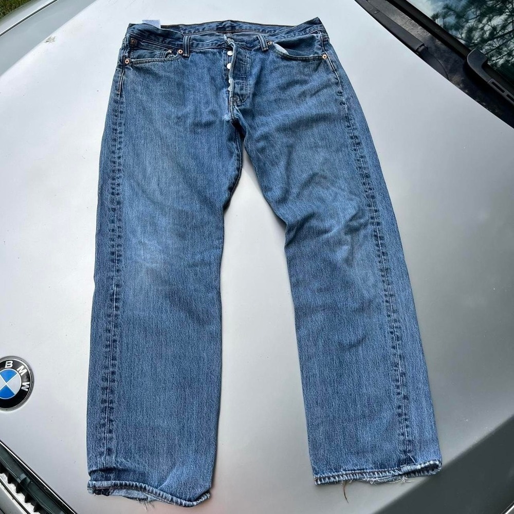 Levi's 501 blue denim jeans with button fly distressed